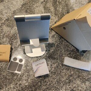 Stand for tablet or phone. Adjustable. Fit size large and small. Metal